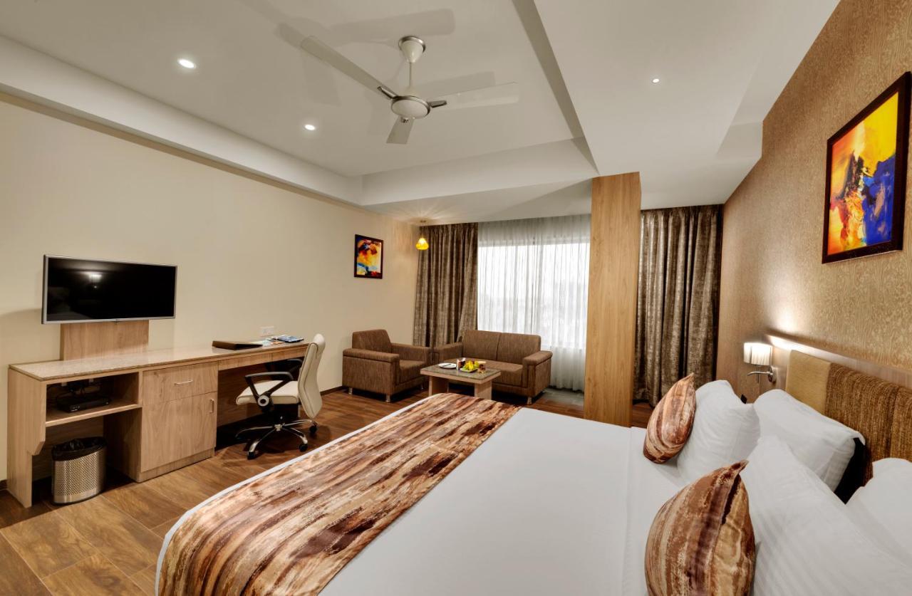 Anaya Beacon Hotel, Джамнагар Номер фото